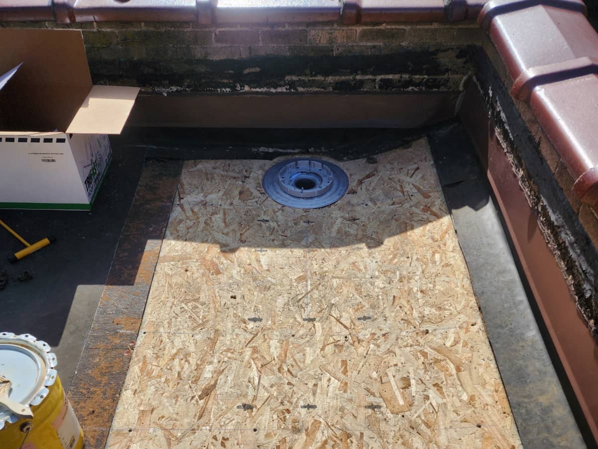 flat roof repair in progress