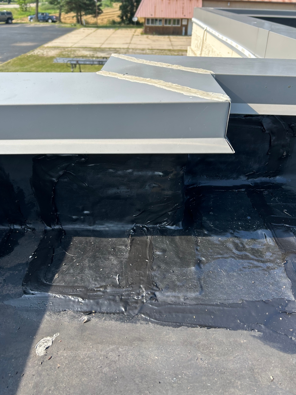 flat roof leak repair with liquid membrane