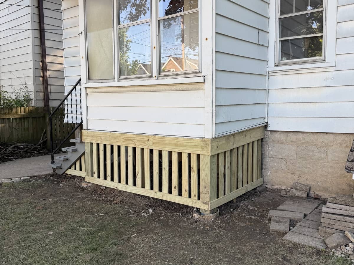 New wooded support below home